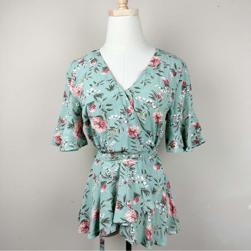 Loft green floral wrap top with peplum sleeves